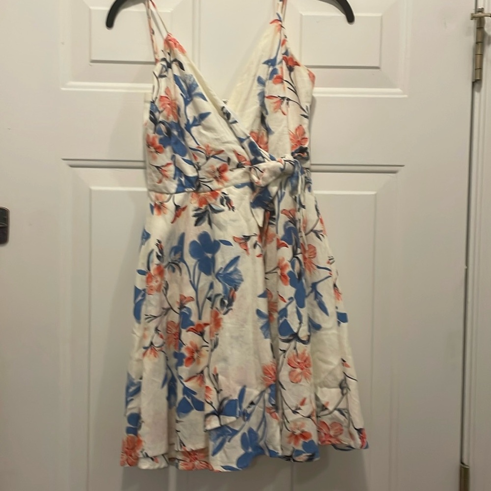 Cream sundress with blue and coral flowers